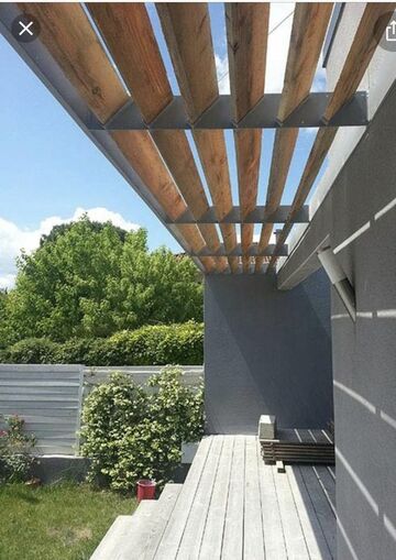 Exemple de brise-soleil, remplaçant une avancée de toiture (2)